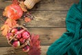 Autumn harvest, pumpkin, apples in basket, colorful autumn leaves on wooden board. Fall still life. Top view. Royalty Free Stock Photo