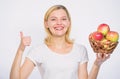 Autumn harvest. Spring seasonal fruit. Happy woman eating apple. farming concept. healthy teeth. orchard, gardener girl Royalty Free Stock Photo