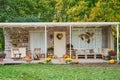 Autumn harvest terrace background. Halloween. Country. Pumpkins and flowers. Vacation home. Thanksgiving Day