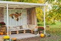 Autumn harvest terrace background. Halloween. Country. Pumpkins and flowers. Vacation home. Thanksgiving Day