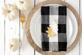 Autumn harvest or thanksgiving dinner table setting. Above view close up on a white wood background. Royalty Free Stock Photo