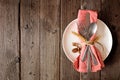 Autumn harvest or thanksgiving tableware top view on a rustic wood background Royalty Free Stock Photo