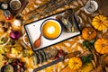 Autumn healthy vegetarian meal pumpkin cream soup with herbs and vegetables, thanksgiving food background