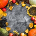 Autumn holiday concept with fallen leaves, vegetables and fruits on old table. Thanksgiving day background, Flat lay, top view Royalty Free Stock Photo