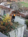 Autumn impose order on the street, and mowing the lawn Royalty Free Stock Photo