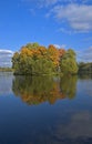 Autumn island reflecting Royalty Free Stock Photo