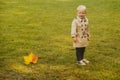 Autumn kids fashion season. Autumn portrait of cute little caucasian child boy. Child in warm coat Clothing. Royalty Free Stock Photo