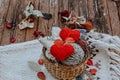 Autumn knitting of warm clothes. Woolen balls of knitting needles knitted hearts. Self-made things with love. Idea for