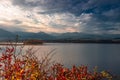 Autumn lake view with dramatic sky