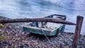 Autumn landscape, abandoned boat on the river bank Royalty Free Stock Photo