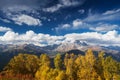 Autumn Landscape with birch forest and mountain range Royalty Free Stock Photo