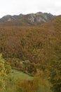 Autumn landscape with bright leaves and frozen peaks in Las Ubinas La Mesa National Park