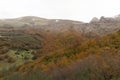 Autumn landscape with bright leaves and frozen peaks in Las Ubinas La Mesa National Park