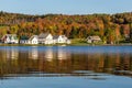 Autumn landscape and cabins on lake shore in Elmore state park Royalty Free Stock Photo