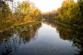 Autumn landscape. Calm river surface reflecting autumn colorful trees. Beautiful autumn background copy space Royalty Free Stock Photo