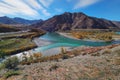 Autumn landscape with drought and turquoise river in the valley. Confluence of two rivers, Katun and Chuya, the famous tourist Royalty Free Stock Photo