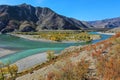 Autumn landscape with drought and turquoise river in the valley. Confluence of two rivers, Katun and Chuya, the famous tourist Royalty Free Stock Photo