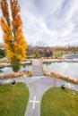 Autumn landscape of Drumul Taberei Park in Bucharest city capital of Romania with cloudy sky and great fall colors Royalty Free Stock Photo