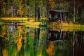 Autumn landscape. Fall colors reflection in lake in Finland Royalty Free Stock Photo