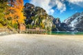 Autumn landscape with famous alpine lake, Braies lake, Dolomites, Italy