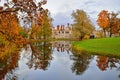 Autumn landscape - Fedorovskiy Gorodok and trees reflected in th Royalty Free Stock Photo