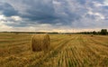 Autumn landscape in a field with hay in the evening, Russia, Ural