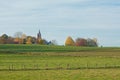 Autumn landscape with historic church in the Flemish countryside Royalty Free Stock Photo