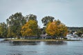 Autumn landscape in the 1000 islands. Houses, boats and islands. Lake Ontario, Canada USA