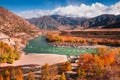 Autumn landscape of Katun river and mountains with yellow trees in Altai, Siberia, Russia Royalty Free Stock Photo