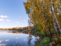 Autumn landscape by the lake, golden autumn, colorful trees and reflections Royalty Free Stock Photo