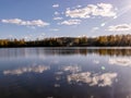 Autumn landscape by the lake, golden autumn, colorful trees and reflections Royalty Free Stock Photo