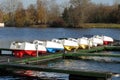 Autumn landscape with many overturned boats on pier ready for conservation for next season Royalty Free Stock Photo