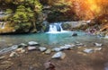 Autumn landscape mountain river with small waterfall and rapids. Royalty Free Stock Photo