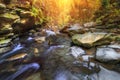 Autumn landscape mountain river with small waterfall and rapids. Royalty Free Stock Photo
