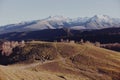 An autumn landscape of mountains on a trip with snow-covered winter peaks in the background Royalty Free Stock Photo