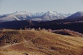 An autumn landscape of mountains on a trip with snow-covered winter peaks in the background Royalty Free Stock Photo