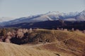 An autumn landscape of mountains on a trip with snow-covered winter peaks in the background Royalty Free Stock Photo