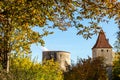 Autumn landscape with multicolored trees and city wall with tower in Berching, Bavaria Royalty Free Stock Photo