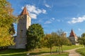 Autumn landscape with multicolored trees and city wall with tower in Berching, Bavaria Royalty Free Stock Photo