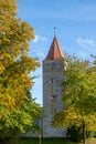 Autumn landscape with multicolored trees and city wall with tower in Berching, Bavaria Royalty Free Stock Photo