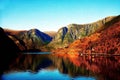 Autumn landscape with Norwegian fiords and evening sun