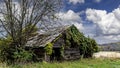 Autumn landscape with an old weathered barn