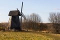 Autumn landscape with old wooden windmill in Mikhaylovskoye Museum Reserve