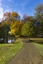 Autumn landscape with a park trail and bridge Royalty Free Stock Photo