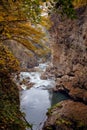 Autumn landscape of rapid mountain river