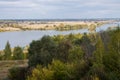 Autumn landscape with river and fields cloudy day