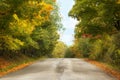 Autumn landscape with road and beautiful trees Royalty Free Stock Photo