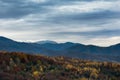 Autumn landscape scene with yellow forest and mountain in the background Royalty Free Stock Photo