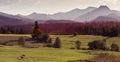 Autumn landscape of Tatra Mountains - misty mountains, frost, cold mornings, colourful trees Royalty Free Stock Photo