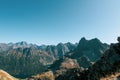 Autumn landscape of Tatra Mountains: Rysy, Mieguszowiecki Peak, Niznie Rysy, Czarny Staw pod Rysami Lake. Royalty Free Stock Photo